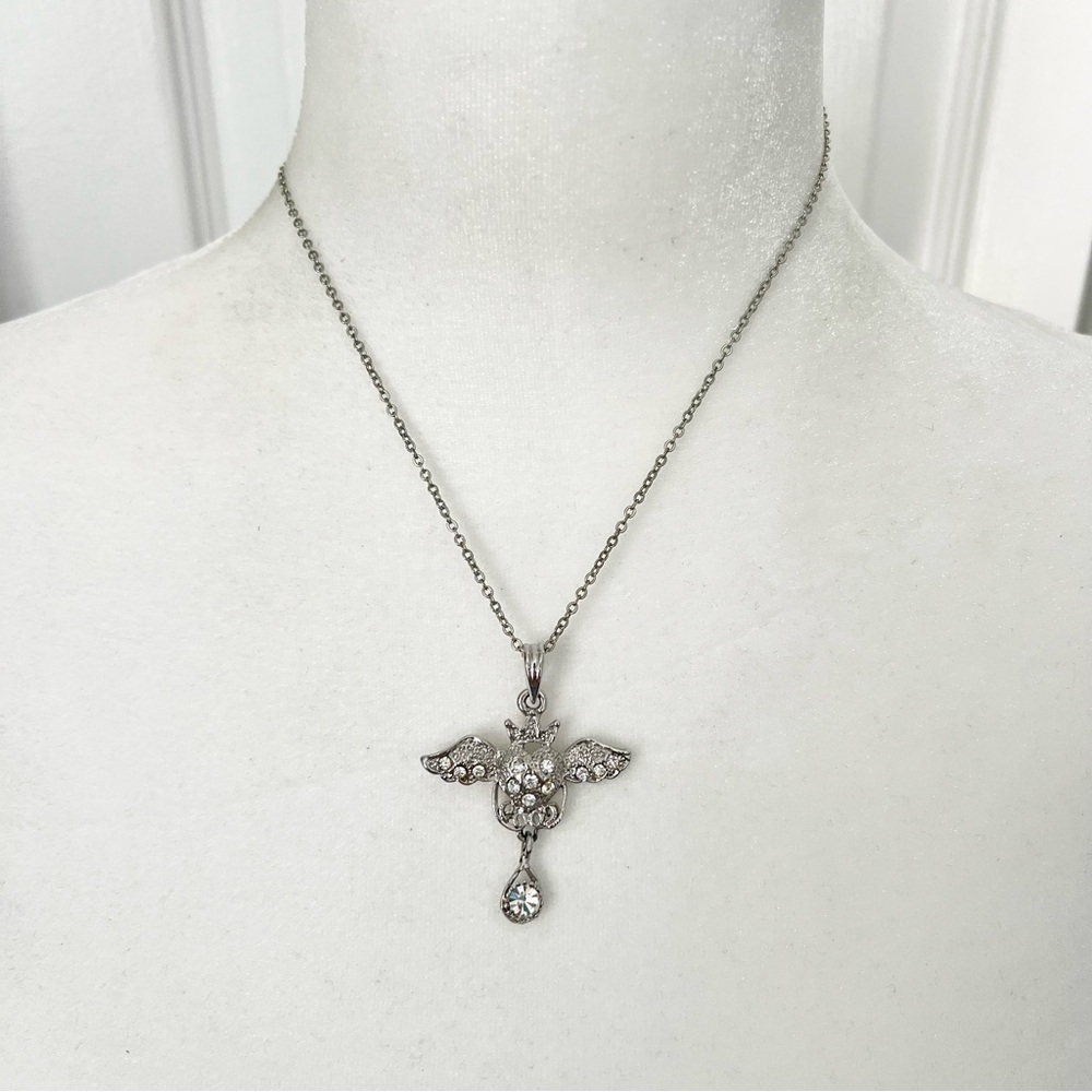 Silver tone jewel studded angel heart pendant necklace